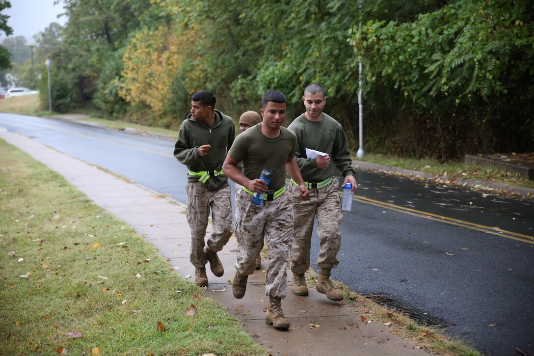 Marines begin the 5th-annual professional military education event, “The Amazing Race” aboard Marine Corps Base Quantico on Oct. 11, 2013. The race consisted of 17 events that participants took part in to get clues and ultimately run the best time.