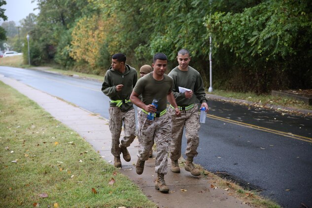 Marines begin the 5th-annual professional military education event, “The Amazing Race” aboard Marine Corps Base Quantico on Oct. 11, 2013. The race consisted of 17 events that participants took part in to get clues and ultimately run the best time.
