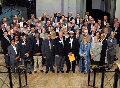 Air Force Gen. Craig McKinley (center-front), chief of the National Guard Bureau, stands with leaders and distinguished guests of the Muslim and National Guard communities for a photo before hosting the second-annual National Guard Iftar Dinner Aug. 8, 2011, in Washington, D.C.