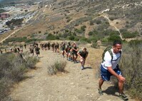 Master Sgt. Ricardo Russo, right, leads the way during a physical training session at the U.S. Marine Corps Staff Non-Commissioned Officer Academy at Camp Pendleton, Calif. The physical training sessions were one of Russo’s favorite parts of the class curriculum. (Courtesy photo)
