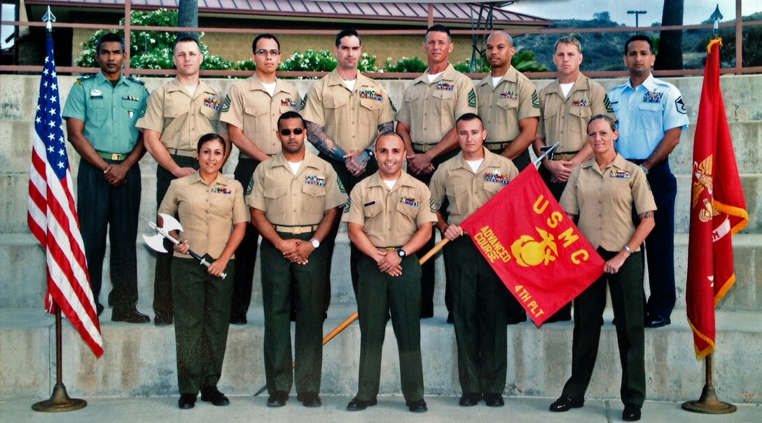 U.S. Marine Corps Staff Non-Commissioned Officer Academy advanced course 4-13, at Camp Pendleton, Calif. Master Sgt. Ricardo Russo, far right, was recently acknowledged as the distinguished graduate for his standout performance at USMC SNCOA (Courtesy photo)