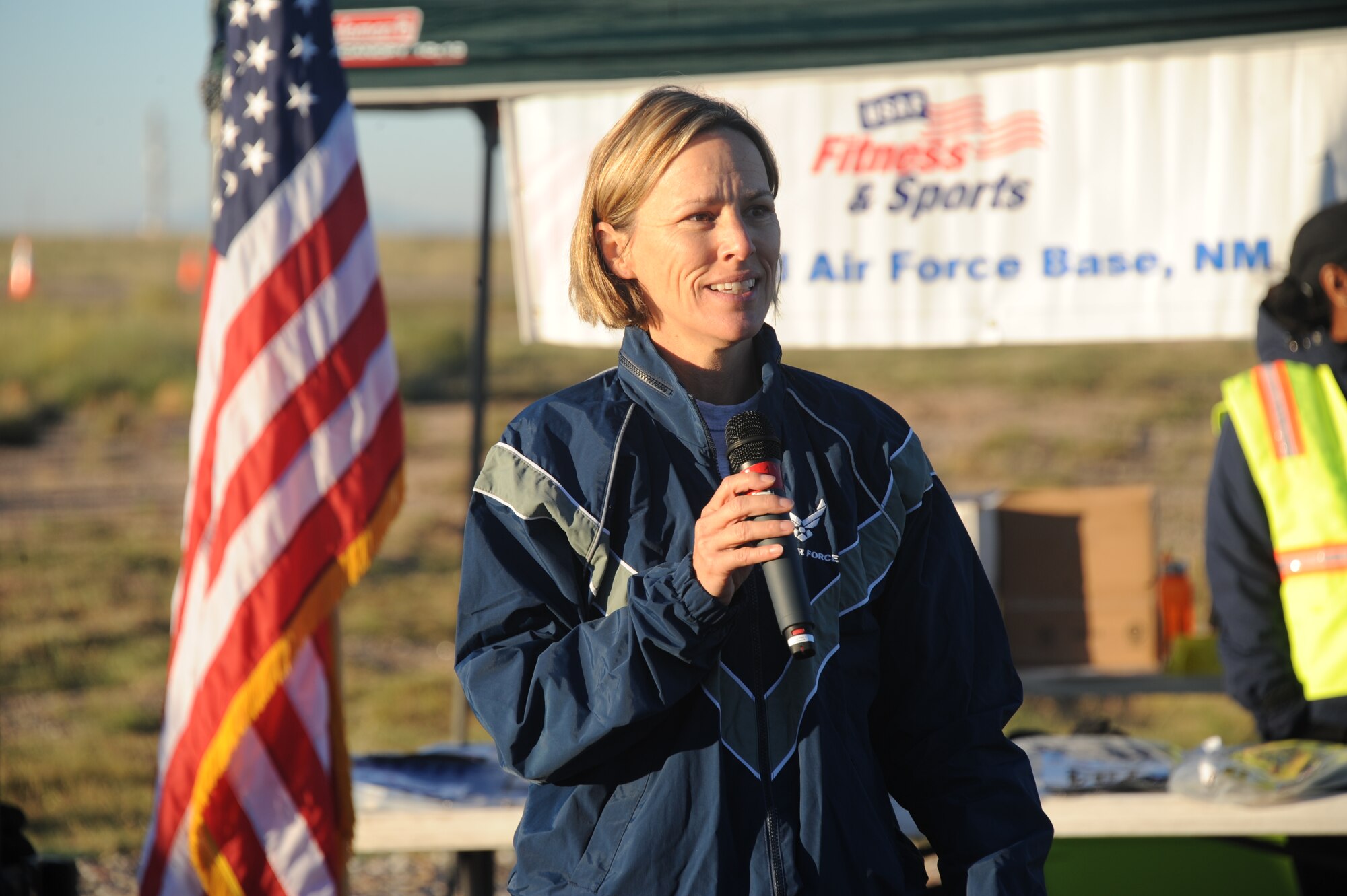 Col. Heather Pringle, 377th Air Base Wing vice commander, gave opening remarks to the runners who braved the cold weather to participate in the Wounded Warrior Half Marathon and 5K.  The race was hosted by the 377th Force Support Squadron Oct. 12 at the Tijeras Arroyo Golf Course. (Photo by Todd Berenger)