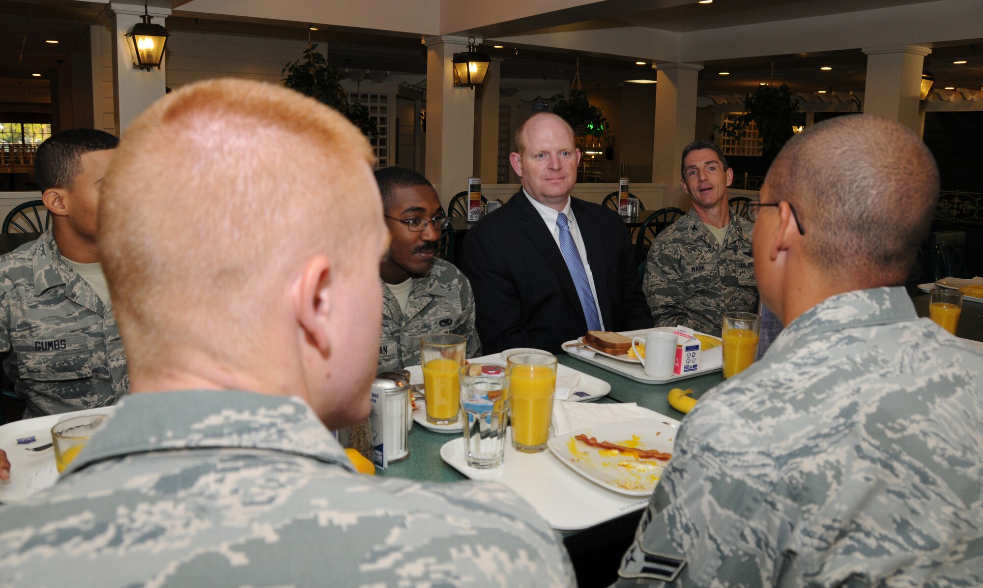 Mr. Jason Forrester, Deputy Assistant Secretary of Defense (Manpower and Personnel) in the Office of the Assistant Secretary of Defense (Reserve Affairs) answer questions from 192D Fighter Wing non-commissioned officers at the Crossbow dinning facility Sept. 21, 2013.  Mr. Forrester viewed the F-22 Raptor, toured various facilities, met with Virginia Air National Guard members and received a guided tour of the 192D Intelligence Squadron, where he received a mission overview of intelligence state and federal capabilities. (U.S. Air National Guard photo by Master Sgt. Carlos J. Claudio/Released).