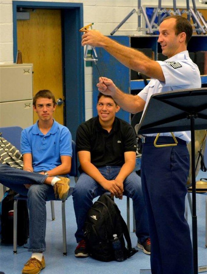 Technical Sgt. Adam Green demonstrates percussion techniques for West
Potomac High School music students at an AIM event on Oct. 1 (Photo by Karl
Hovey)
