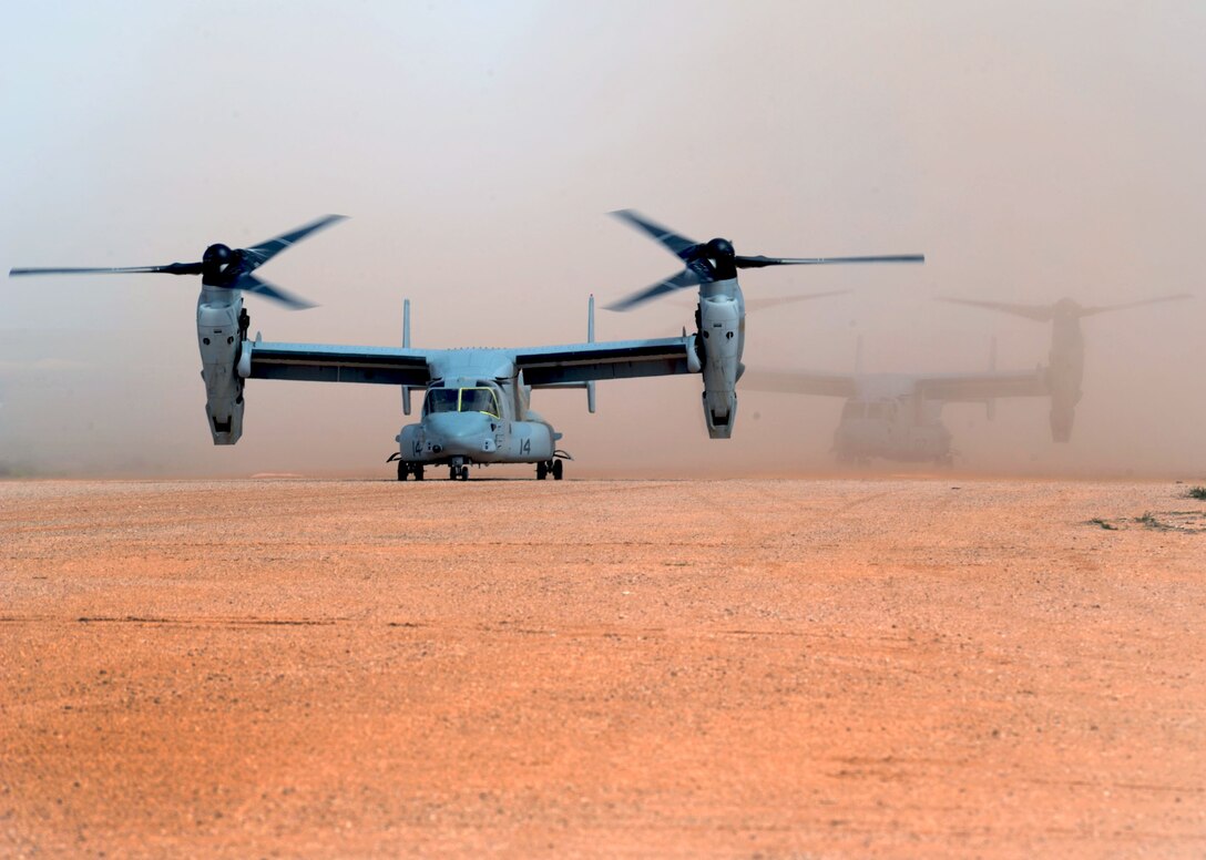 Two MV-22 Ospreys take off Sept. 30, 2013 at Melrose Air Force Range, N.M. Marine members from the 22nd Marine Expeditionary Unit, Camp Lejeune, N.C. used Melrose Range to accomplish a new distance record for the MV-22 Osprey. (U.S. Air Force photo/Senior Airman Ericka Engblom)