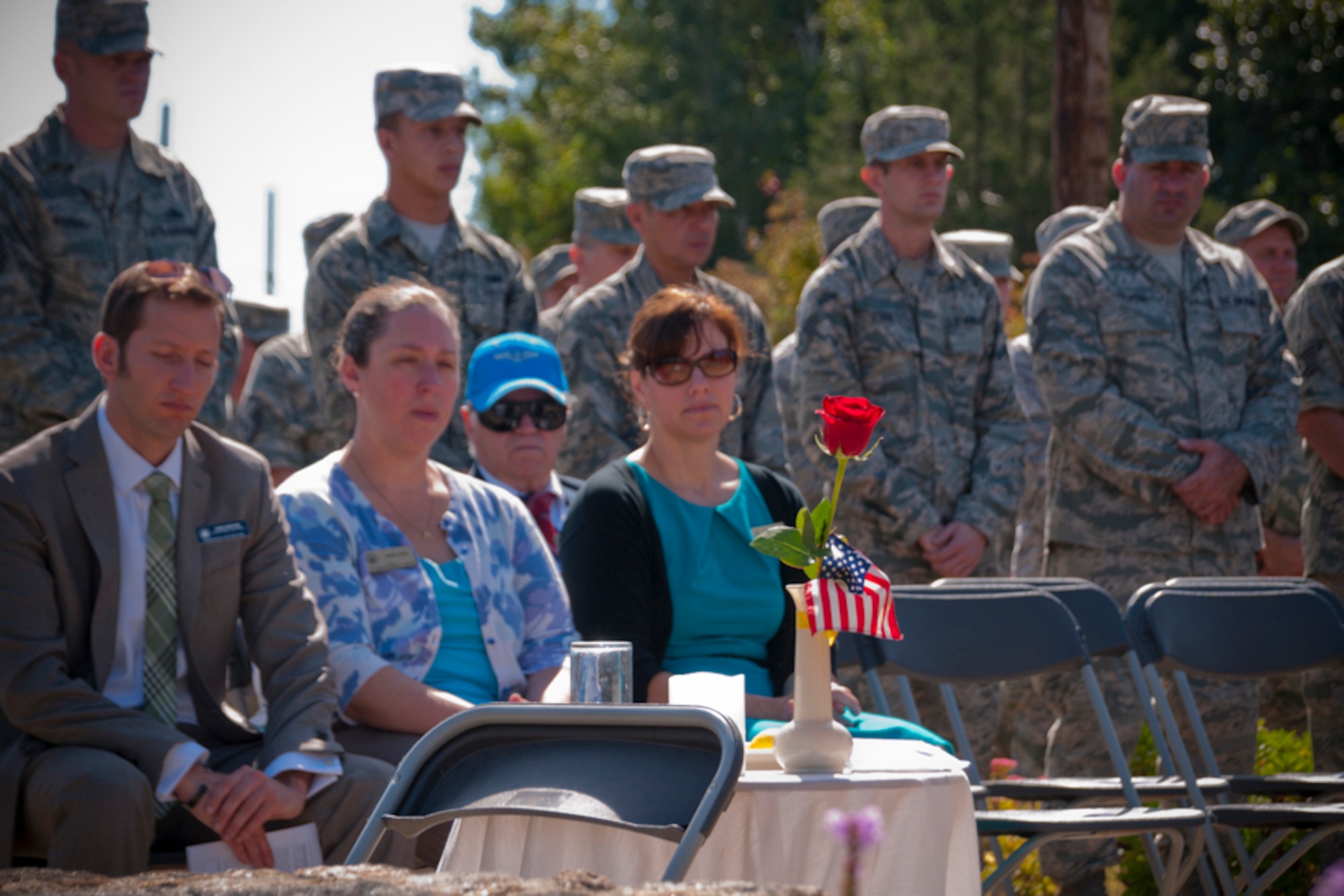 N.H. Air National Guard and Active Duty Airmen, as well as N.H. Congressional Delegates, gather to honor those Americans who are Prisoners of War or are Missing in Action (POW/MIA), Sept. 20, 2013, Pease Air National Guard Base, N.H. The ceremony was held during the National POW/MIA Recognition Day. (Air National Guard photo by Tech. Sgt. Aaron Vezeau/Released)