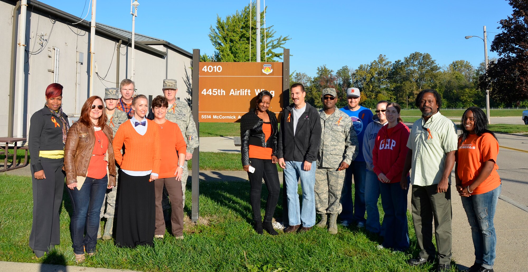 WRIGHT-PATTERSON AIR FORCE BASE, Ohio – Fifteen people from the 445th Airlift Wing show their support Oct. 9 by wearing orange to support Bullying Prevention Month. Wearing orange signifies supporting those who have experienced bullying. Leading the effort at the wing and sharing information about bullying is the North Region Psychological Health Advocacy Program staff.  (U.S. Air Force photo/Lt. Col. Cynthia Harris) 