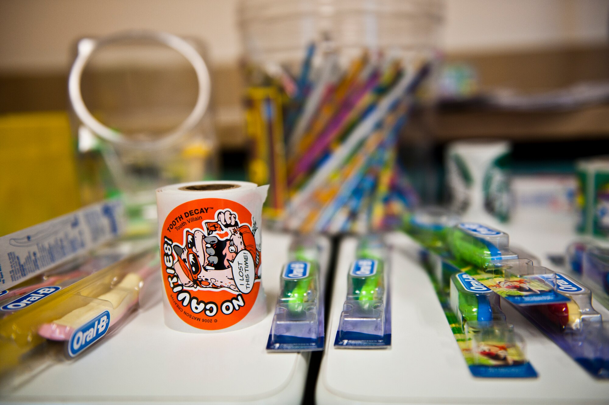 Supplies for children’s’ gift bags lie on a table for “Little teeth, big smiles” Oct. 12, 2013, at Incirlik Air Base, Turkey. The patients were given bags with educational material on proper dental care after receiving a dental checkup. (U.S. Air Force photo by Senior Airman Daniel Phelps/Released)
