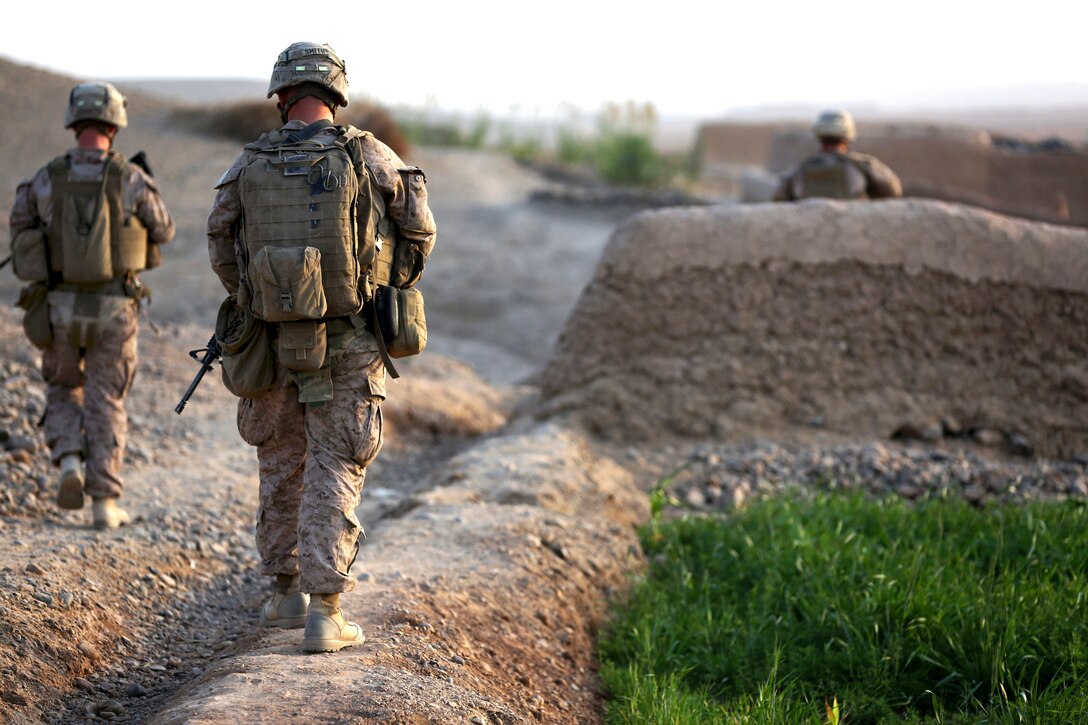 U.S. Marines patrol in Helmand province, Afghanistan, Oct. 12, 2013.