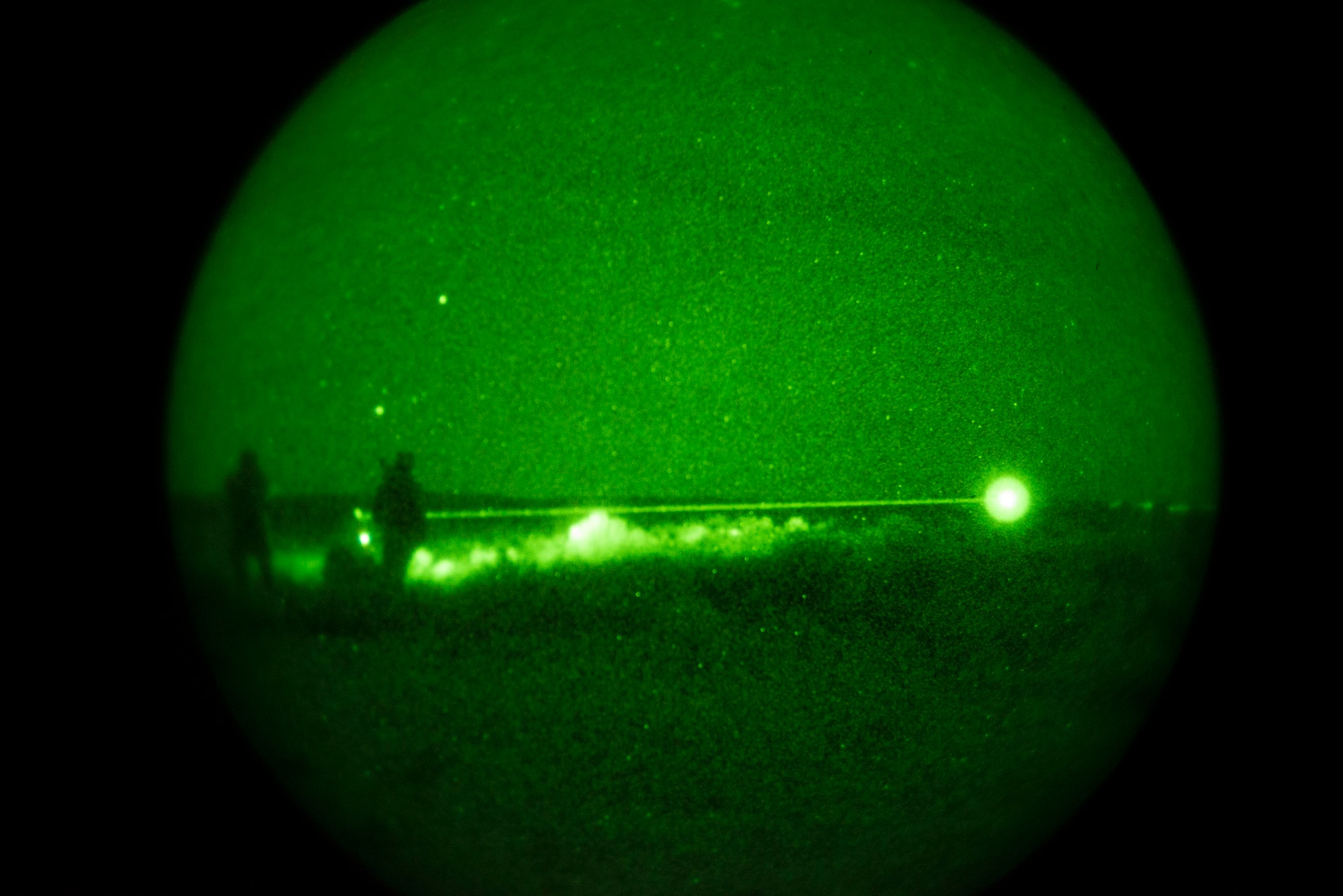 U.S. Marine Capt. Erich Lloyd, Cpl. Andrew Dimauro and Cpl. Daniel Soto, all 1st Air Naval Gunfire Liaison Company Supporting Arms Liaison Team Delta joint terminal attack controllers or forward air controllers, directs close-air support using an infrared pointing and illuminating laser (or B.E. Meyer’s ‘IZLID’) to ‘paint’ targets for inbound AV-8B Harriers, during exercise Mountain Roundup 2013 at Mountain Home Air Force Base, Idaho, Oct. 8, 2013. The exercise is part of the German Air Force Tornado Fighter Weapons Instructor Course Mission Employment Phase, and is scheduled to end Oct. 16. (U.S. Air Force photo by Master Sgt. Kevin Wallace/RELEASED)