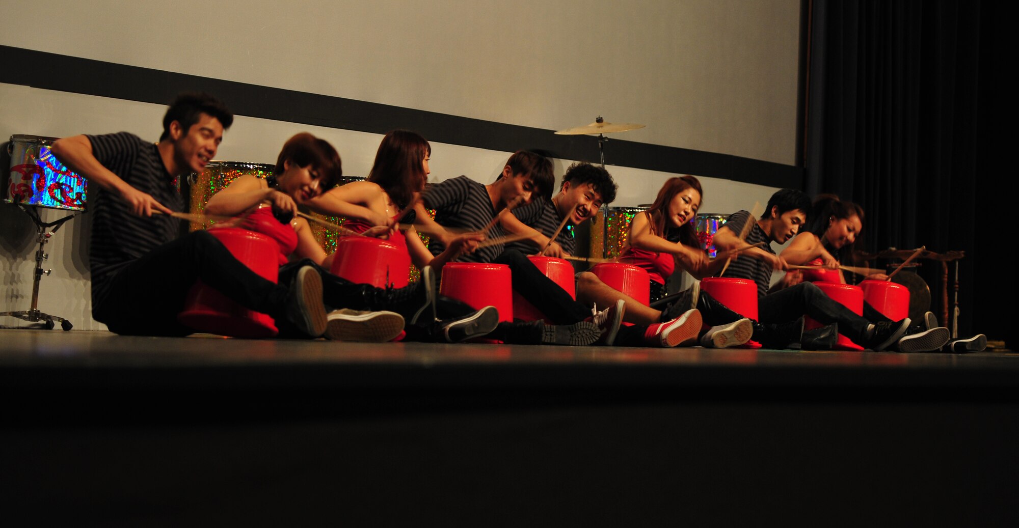 DoDo and Last for One perform together for a group of Korean and American Airmen at Kunsan Air Base, Republic of Korea, Oct. 15, 2013. The Republic of Korea air force hosted the percussion group DoDo and break dancing crew Last for One for a concert here. The performers merged traditional Korean style drumming with western hip-hop style dancing. (U.S. Air Force photo by Senior Airman Armando A. Schwier-Morales/Released)