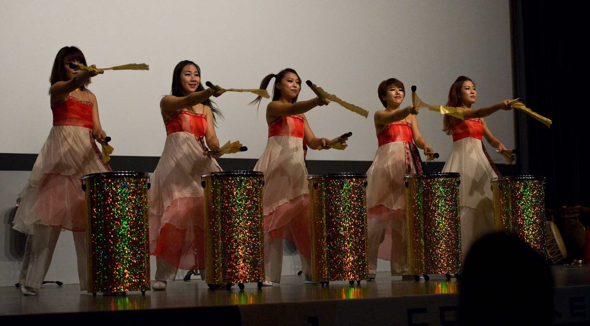 The percussion group DoDo performs for Airmen stationed at Kunsan Air Base, Republic of Korea, Oct. 15, 2013. The Republic of Korea air force hosted the percussion group DoDo and break dancing crew Last for One for a concert here. The performers merged traditional Korean style drumming with western hip-hop style dancing. (U.S. Air Force photo by Senior Airman Armando A. Schwier-Morales/Released)