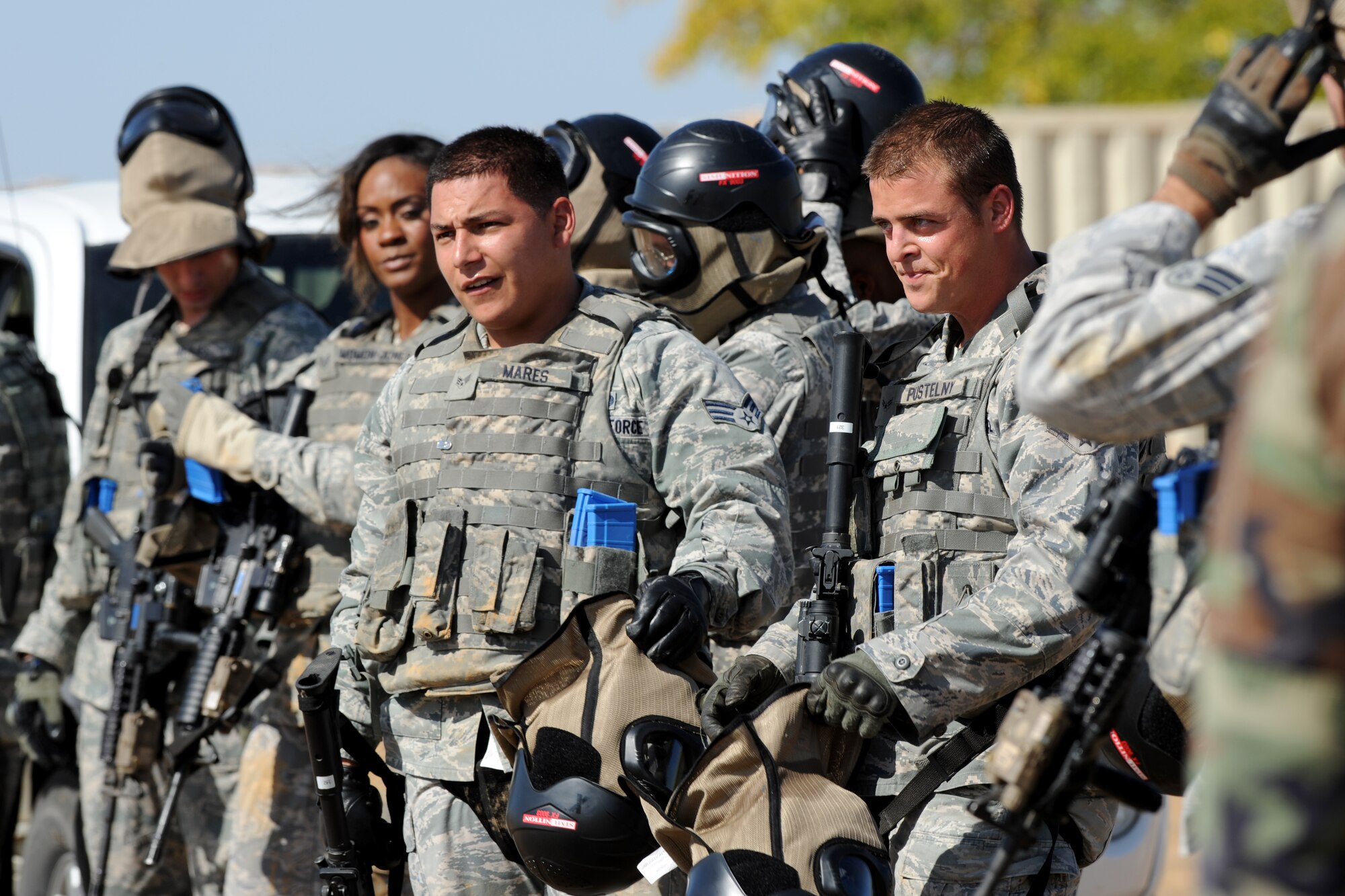 Airmen from the 9th Security Forces Squadron successfully complete a pilot-rescue exercise at Beale Air Force Base, Calif., Oct. 9, 2013. The exercise utilized the 9th SFS, Air Force contractors and a MC-12W Liberty. (U.S. Air Force photo by Staff Sgt. Robert M. Trujillo/Released)