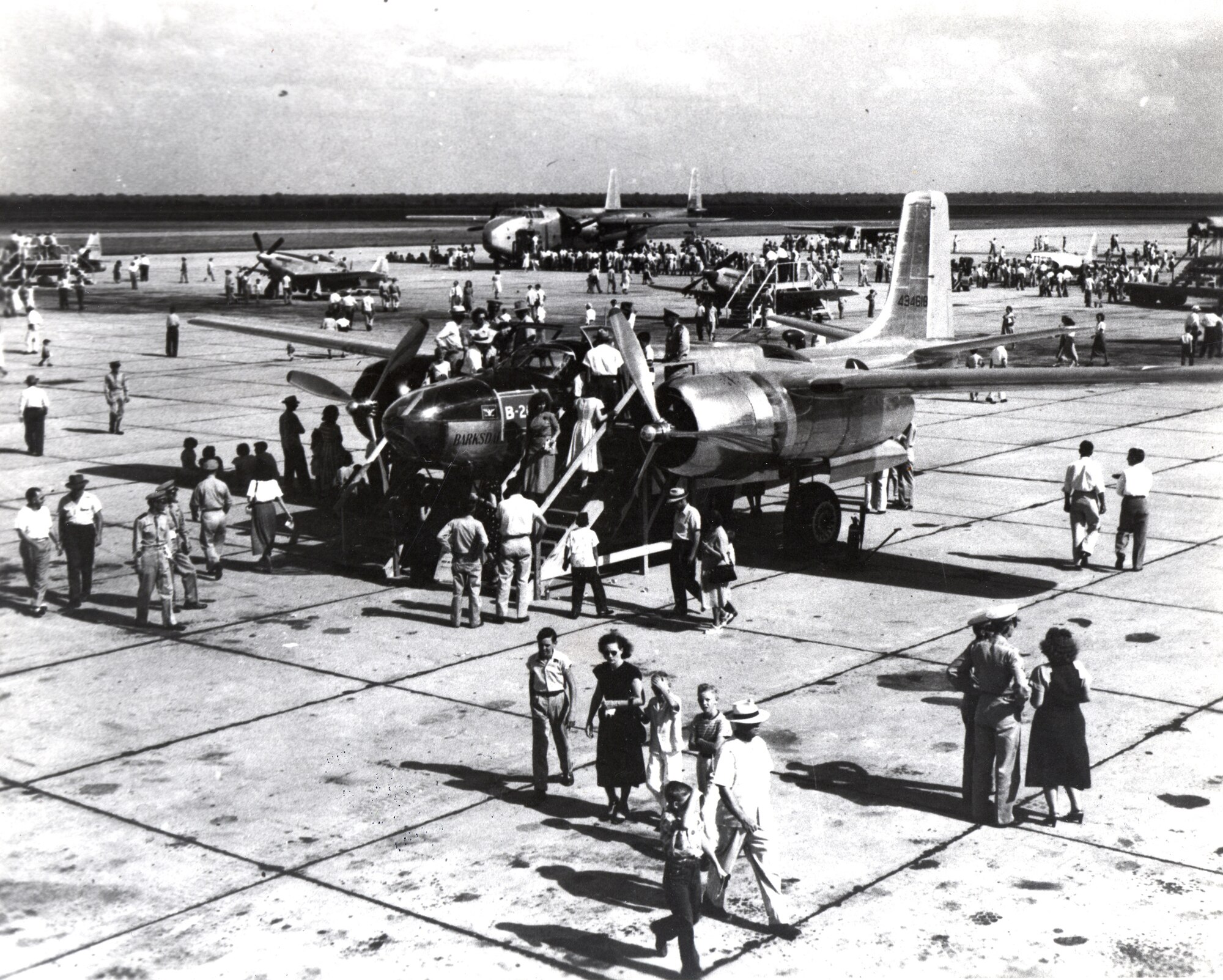 Citizens from Shreveport and Bossier City, La., and surrounding communities tour Barksdale Field during an open house on the base in 1947, approximately one year before the base was renamed Barksdale Air Force Base. Today's air shows and open houses are conducted in partnership with local community organizations who help fund civilian acts, publicity and other special needs to supplement military demonstration teams and static displays. (Photo provided by Dennis Pinner, 2nd Bomb Wing Historian)