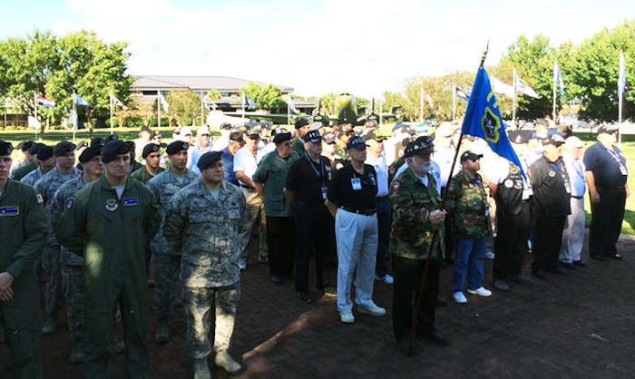 Airmen, Sailors and members of the Vietnam Security Police Association stand in formation at a retreat ceremony held October 15, 2013, at Joint Base Charleston – Air Base, S.C. The Vietnam Security Police Association is a team of former active-duty Air Force Security Police members who served in Vietnam during the Vietnam War. (Courtesy photo)