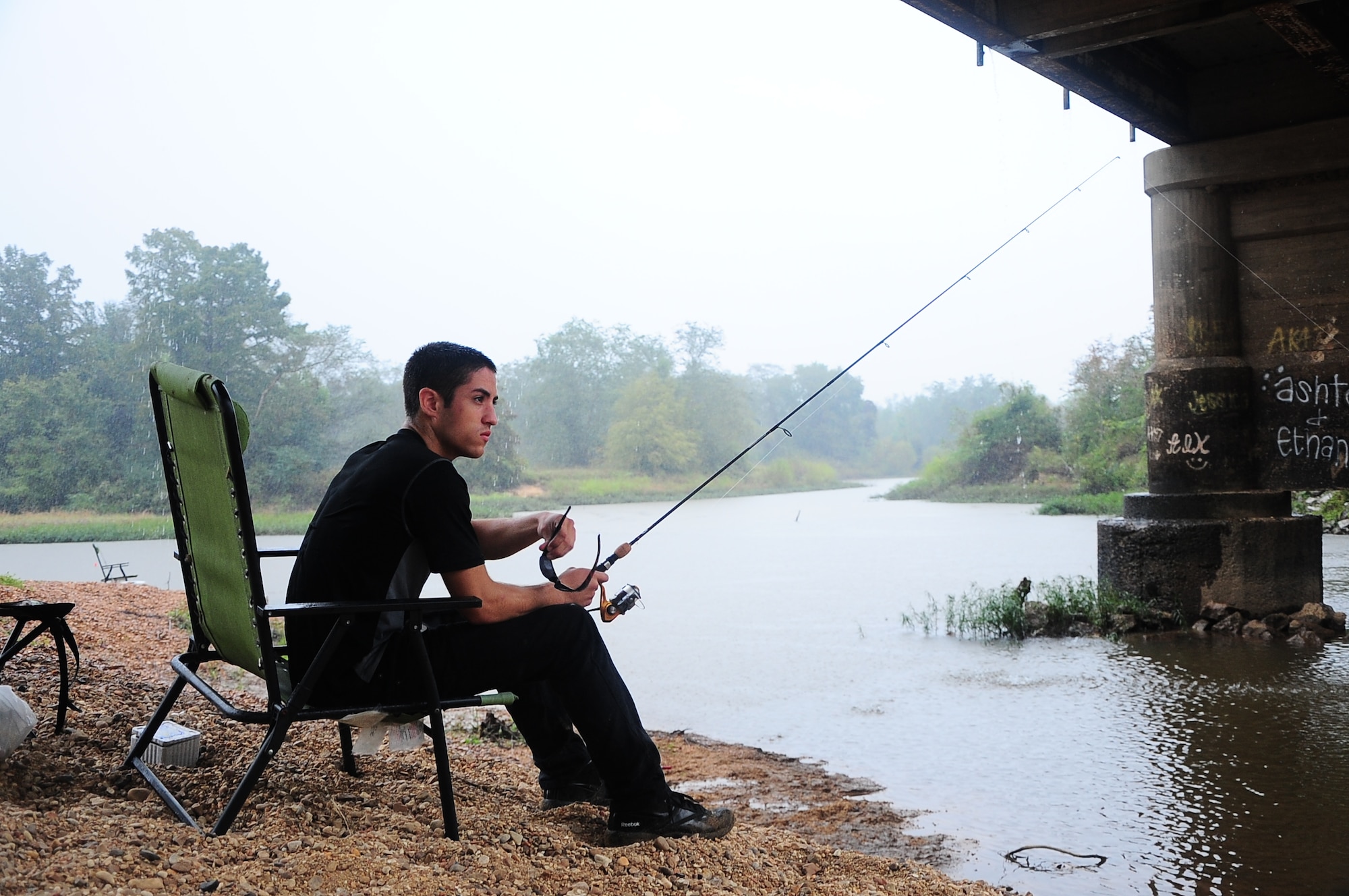 Airman 1st Class James Beadling III, 14th Operations Support Squadron, goes fishing Oct. 5 at the RiverWalk in Downtown Columbus, Miss. There are many places to go fishing on and around Columbus Air Force Base. (U.S. Air Force Photo/Airman Daniel Lile)