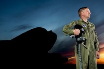 Col. Max B. Mitchell stands in front of the B-52H Stratofortress for the last time as an active duty Airman, Oct. 9. After serving as vice wing commander of the 5th Bomb Wing, Mitchell officially retired from the U.S. Air Force, Oct. 11. Mitchell served 25 years with nearly 4,000 flying hours in the B-52 as a master navigator. (U.S Air Force photo/Tech. Sgt. Aaron Allmon)