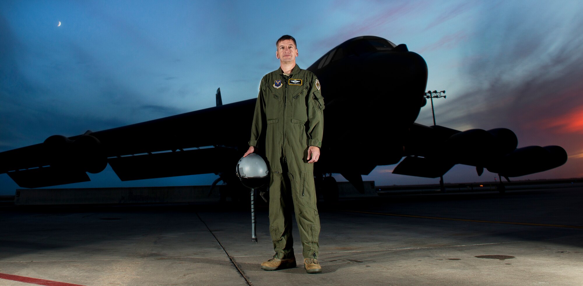 Col. Max B. Mitchell stands in front of the B-52H Stratofortress for the last time as an active duty Airman, Oct. 9. After serving as vice wing commander of the 5th Bomb Wing, Mitchell officially retired from the U.S. Air Force, Oct. 11. Mitchell served 25 years with nearly 4,000 flying hours in the B-52 as a master navigator. (U.S Air Force photo/Tech. Sgt. Aaron Allmon)