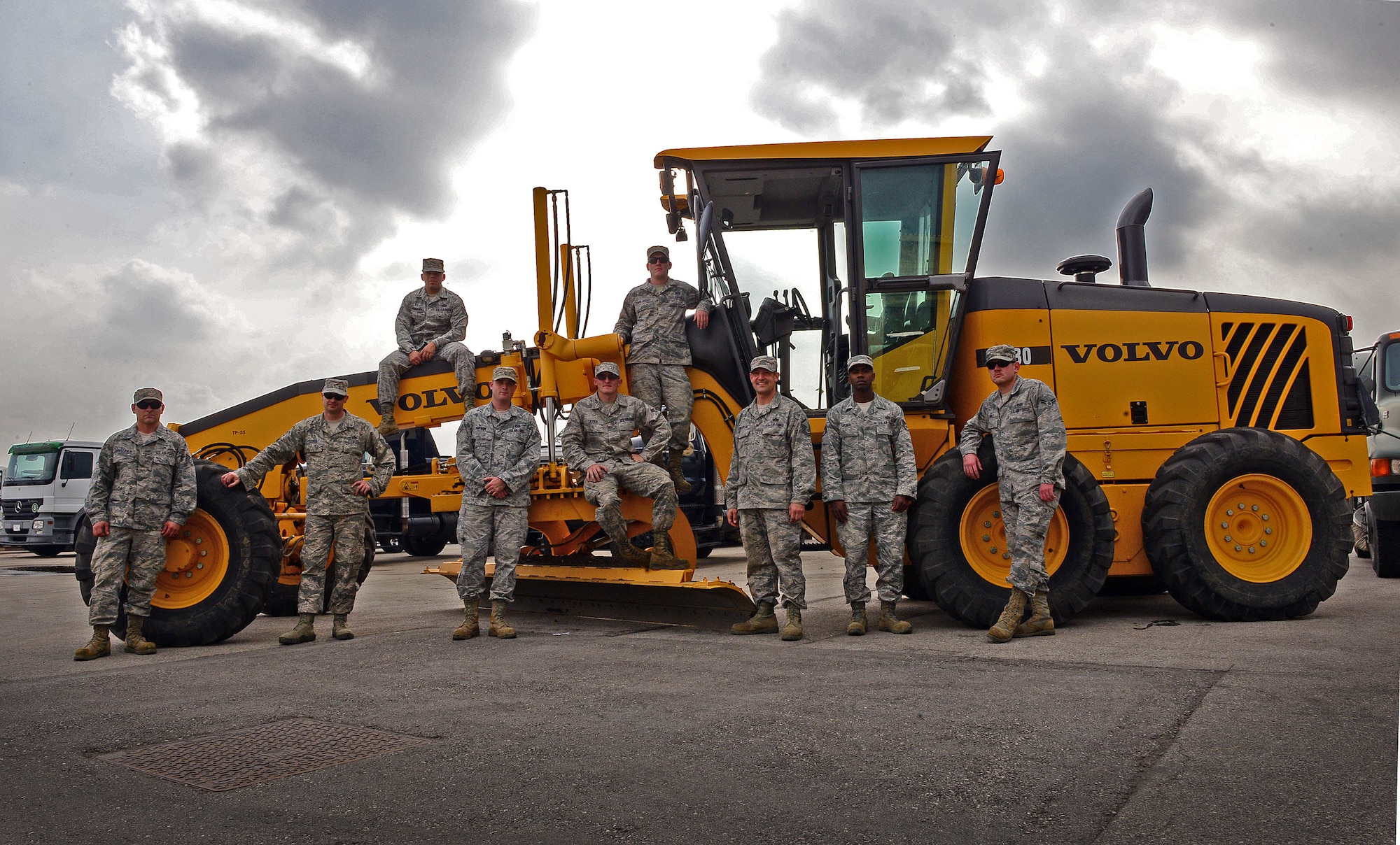 Airmen of the 31st Civil Engineer Squadron, also known as the “Dirt Boys”, pose on their equipment, Oct. 15, 2013, at Aviano Air Base, Italy. Recently the “Dirt Boys” saved the U.S. Air Force approximately $40,000 by using recycled asphalt to build a new parking lot that helped alleviate parking and traffic issues near the Area 1 Child Development Center. (U.S. Air Force photo/Senior Airman Matthew Lotz)