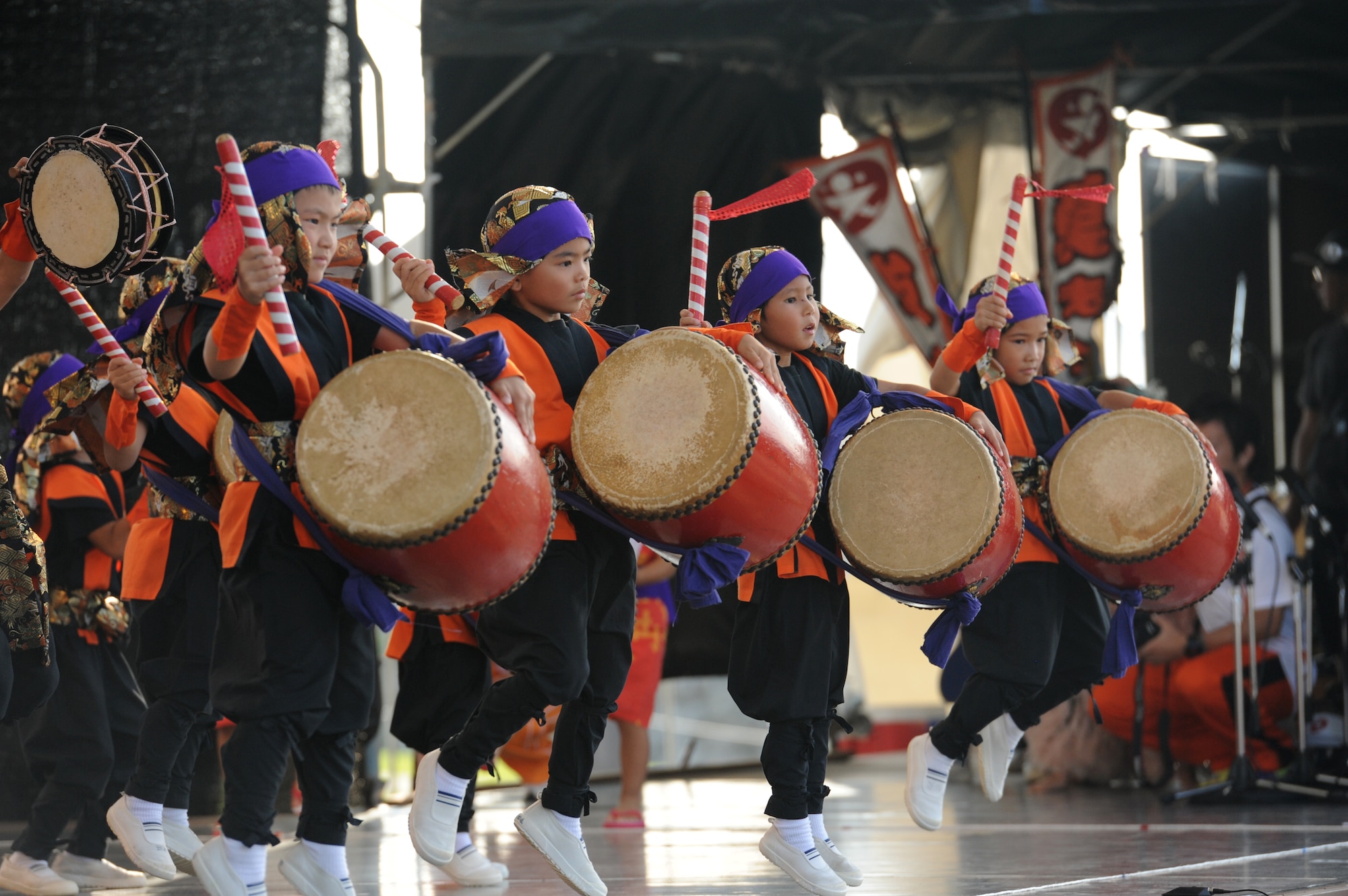 Children at the Noguni Sokan Festival showcase their local culture through Eisa dance on Okinawa, Japan, Oct. 12, 2013. A Japanese tea ceremony, sweet potato digging and sumo wrestling was also featured at the festival. (U.S. Air Force photo by Senior Airman Malia Jenkins)