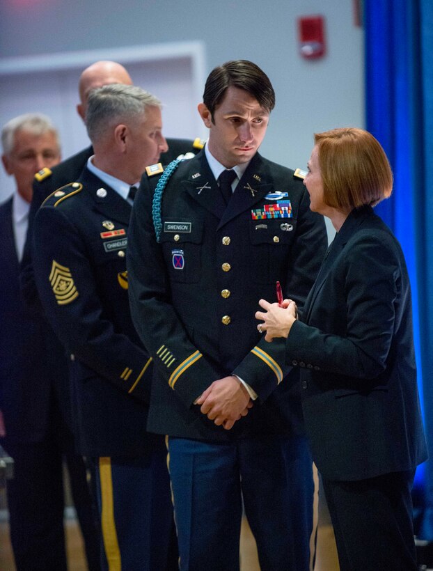 Former Army Capt. William D. Swenson, Medal of Honor recipient, prepares for a ceremony to induct him into the Hall of Heroes at the Pentagon, Oct. 16, 2013.