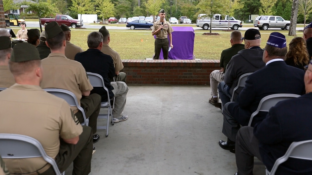 Lt. Col. Leland W. Suttee, Wounded Warrior Battalion-East commanding officer, speaks during the Purple Heart Memorial unveiling at the WWBn-East barracks aboard Marine Corps Base Camp Lejeune, Oct. 11. Base officials, including Brig. Gen. Robert F. Castellvi, Marine Corps Base Camp Lejeune commanding general, attended the ceremony.