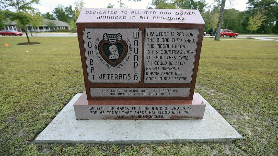 The Purple Heart Memorial reads “My stone is red for the blood they shed. The medal I bear is my country’s way to show they care. If I could be seen by all mankind maybe peace will come in my lifetime” at the Wounded Warrior Battalion-East barracks aboard Marine Corps Base Camp Lejeune, Oct. 11. Beirut Memorial Chapter 642 Military Order of the Purple Heart donated the memorial to the battalion. “This means a great deal to me and all those in my chapter,” said Grant Beck, Chapter 642 commander. “We have received the Purple Heart and understand the heartache the young men and women who wear the medal go through.”
