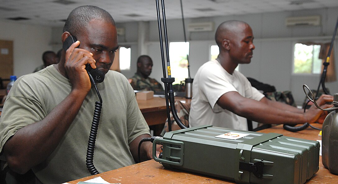 An Armed Forces of Liberia soldier tests his work after programming frequencies into a CODAN 2110 Manpack Transceiver during a radio familiarization class at Camp Ware, Liberia, Sept. 11, 2013. With support from the U.S. Embassy Office of Security Cooperation, OOL mentors delivered a package of CODAN radios and provided training on the equipment to AFL communications soldiers. OOL provides mentorship to the AFL to produce a capable, respected force able to protect Liberian interests in the West African region. In addition, OOL is developing the leadership capabilities of the officers and noncommissioned officers to maintain a professional and credible military force with a reputation as a “force for good” among the Liberian people. 