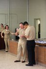 Navy Capt. Michael Sokolowski (left), the commanding officer of 2nd Medical Battalion, Combat Logistics Regiment 25, 2nd Marine Logistics Group and the oldest sailor present, and Seaman Ramon Soltero, a hospital corspman with 2nd Med. Bn. and the youngest sailor present, eat the first bites of birthday cake during a ceremony aboard Camp Lejeune, N.C., Oct. 11, 2013. 2nd Med. Bn. held the ceremony to celebrate the Navy’s 238th birthday.(U.S. Marine Corps photo by Lance Cpl. Shawn Valosin)