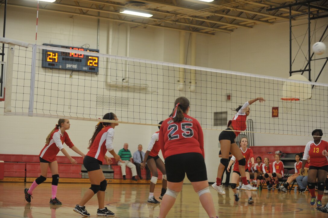 Marquis, Quantico Varsity Volleyball Team’s captain, returns a volley during a match against Grace Preparatory School hosted at the Quantico Middle/High School on Oct. 8, 2013. Quantico won three games in a row against the Grace Preparatory team.