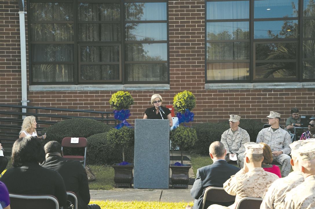 Silke Deeley, executive director, Liberty House, Albany, Ga., addresses the audience during the Domestic Violence Awareness Proclamation Ceremony Oct. 9 at the Town and Country Restaurant, here.