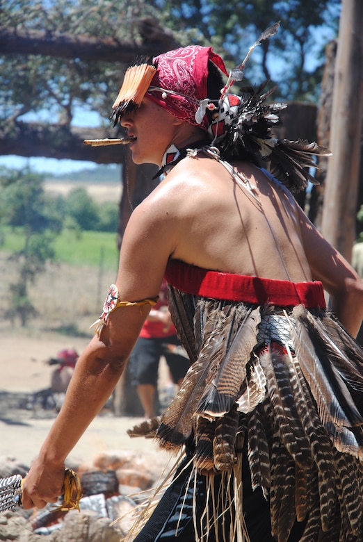 A dancer performs in front of a crowd during a "Big Event" hosted by the Dry Creek Rancheria Band of Pomo Indians July 27 at Lake Sonoma.