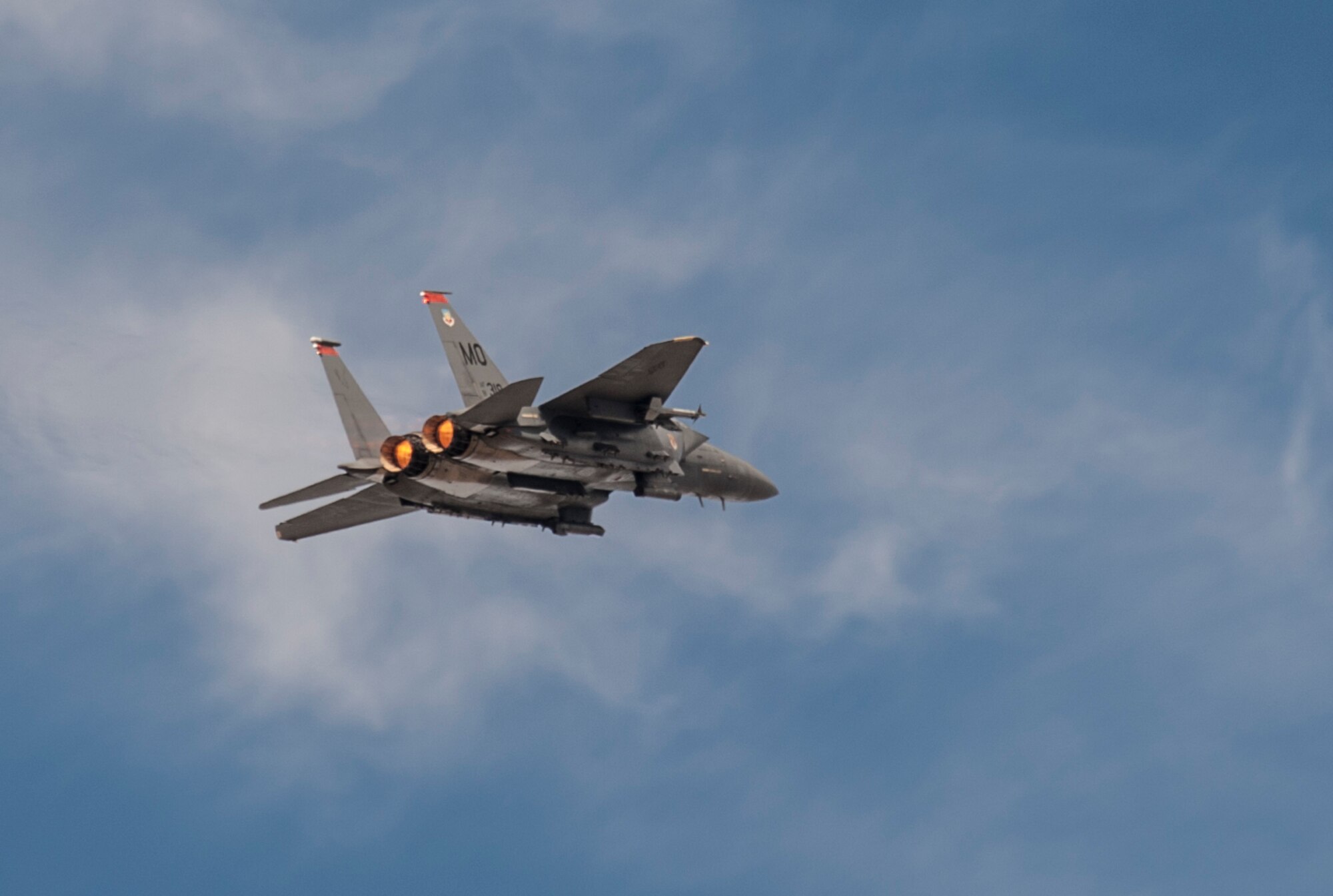 A 391st Fighter Squadron F-15E Strike Eagle soars in the desert sky during exercise Mountain Roundup 2013, at Saylor Creek bombing range near Mountain Air Force Base, Idaho, Oct. 16, 2013. Realistic training provides the U.S. and partnered warfighters with the combat edge. Mountain Home has hosted the training since 2004 because the base has the right mix of air space, modern ranges and proficient personnel, which creates the perfect location for this type of combined-joint training. (U.S. Air Force photo by Master Sgt. Kevin Wallace/RELEASED)