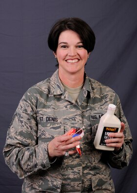 Tech. Sgt. Crystal St. Denis, 354th Medical Group NCO in charge of moulage, displays a portion of her tools used to create injuries Oct. 2, 2013, Eielson Air Force Base, Alaska. St. Denis can simulate just about any injury with liquid latex, toilet paper, makeup and fake blood. (U.S. Air Force photo by Senior Airman Ashley Nicole Taylor/Released)