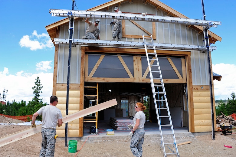 U.S. National Guardsmen from the Missouri Air National Guard, 139th Civil Engineer Squadron continue with construction of a couple structures at the YMCA Snow Mountain Ranch, Winter Park, Colo., July 30, 2013. This training is a part of the National Guard's Innovative Readiness Training program, a civil-military affairs program that links military units with civilian communities to work on community projects, which may otherwise be unfunded. (US Air National Guard Photo by Staff Sgt. Nicole Manzanares)