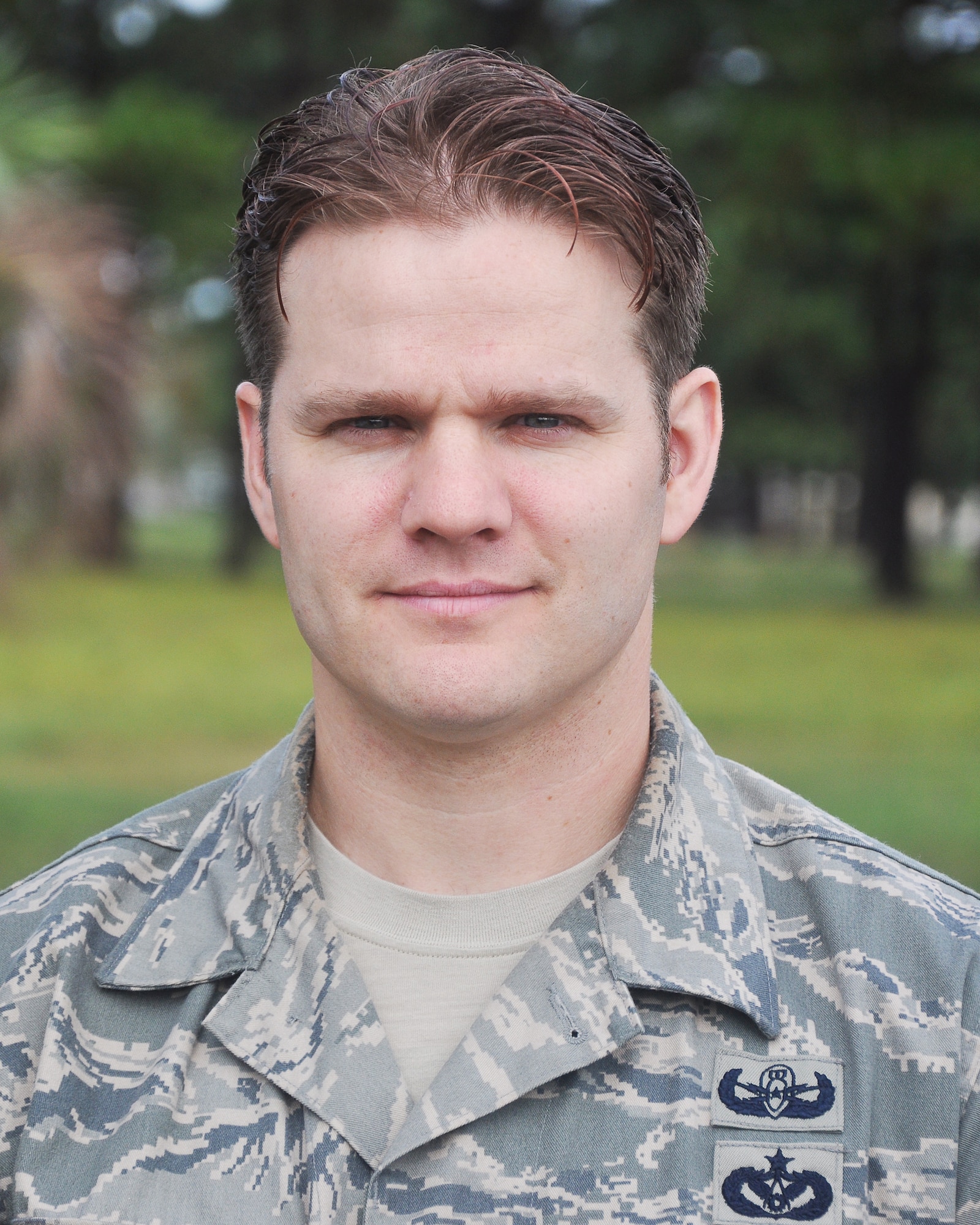 Tech. Sgt. Joseph Gutshall, 325th Fighter Wing Explosive Ordinance Disposal technician, poses for a portrait Oct. 7 on Tyndall. He is a recipient of the Purple Heart for injuries sustained while driving in Afghanistan. (U.S. Air Force photo by Airman 1st Class Alex Echols)