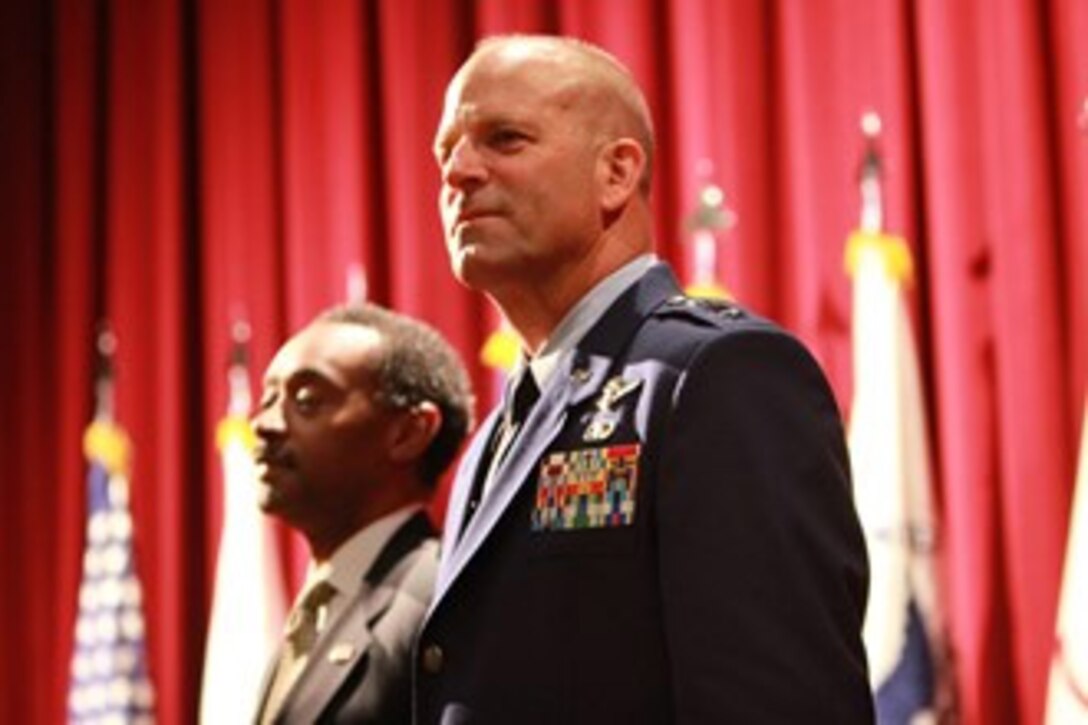 Air Force Maj. Gen. (Dr.) Douglas J. Robb was promoted to lieutenant general at a Sept. 27 ceremony at Fort Leslie J. McNair, Washington, D.C.  Robb is the first director of the Defense Health Agency, which begins Oct. 1 at military health headquarters in Falls Church, Va. (DOD photo/Daniel Henry) 