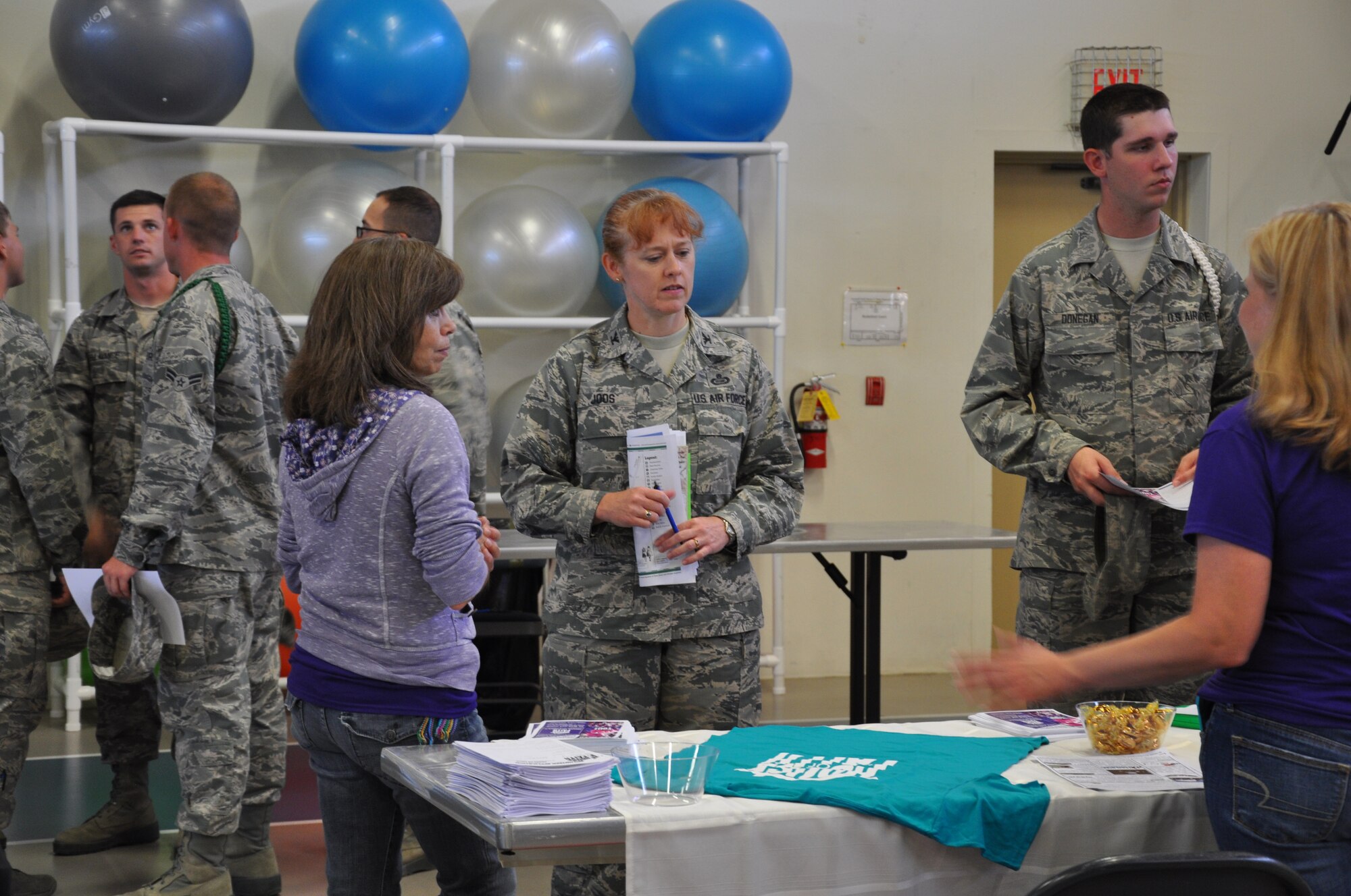 GOODFELLOW AIR FORCE BASE, Texas- Col. Kimberlee Joos, 17th Training Wing Commander, talks to members of House of Faith during the Volunteer Fair at the Carswell Fitness Center Oct. 9. The Volunteer Fair aimed to bring members of Goodfellow and non-profit organizations in the community together in one place. (U.S. Air Force photo/ Airman 1st Class Erica Rodriguez)