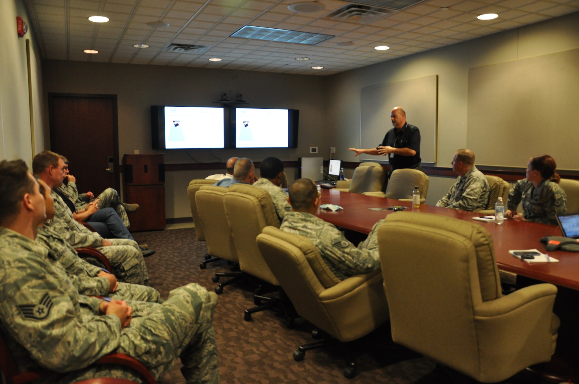 GOODFELLOW AIR FORCE BASE, Texas- David Sullens, 17th Training Wing community support leader, leads a group in discussion about Comprehensive Airmen Fitness along with sexual assault and suicide prevention during Wingman Day here Oct. 9. The discussions aimed to teach all attendees that they play a vital role in prevention and members must come together. (U.S. Air Force photo/ Airman 1st Class Erica Rodriguez)