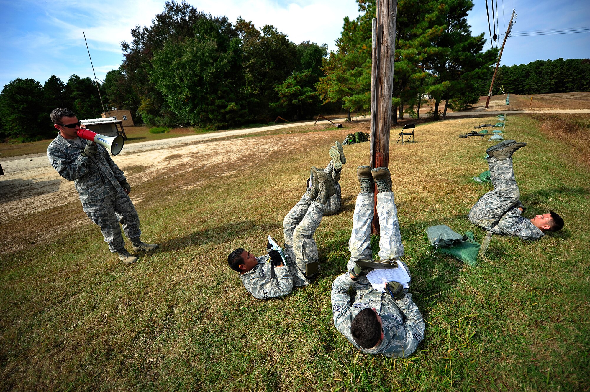 JOINT BASE MCGUIRE-DIX-LAKEHURST, N.J. – Airmen assigned to the 621st Contingency Response Wing record information during a stressed memorization exercise on a training range as part of close precision engagement indoctrination course here Oct. 3.  Seven sharpshooter candidates were participating in a 10-day CPEC indoctrination course to prepare them for the more rigorous 19-day U.S. Air Force CPEC course at Fort Bliss, Texas.  (U.S. Air Force photo by Tech. Sgt. Parker Gyokeres)