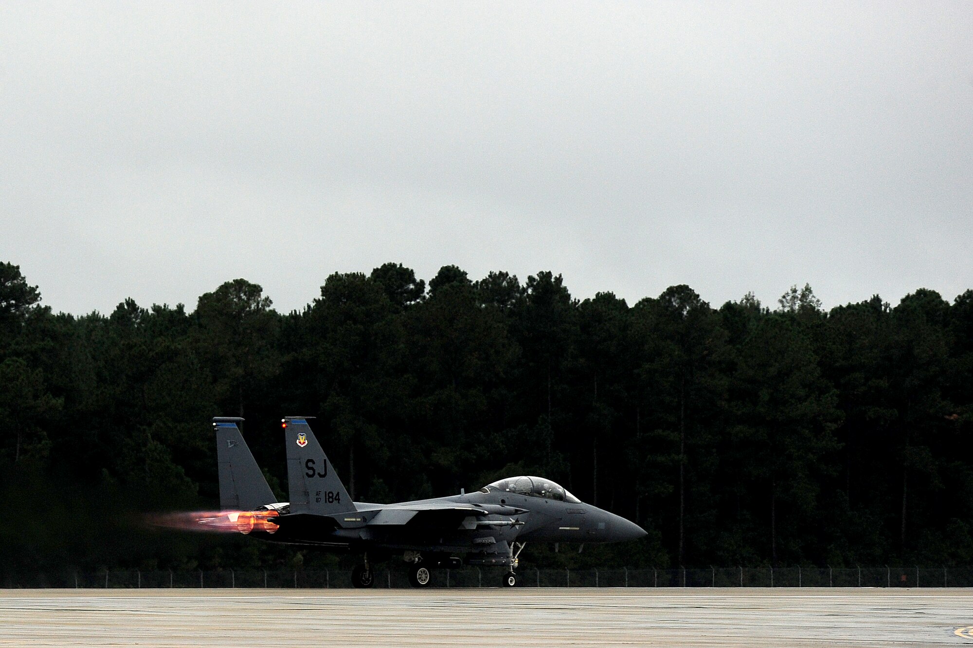 An F-15E Strike Eagle assigned to the 334th Fighter Squadron takes off for a training mission at Seymour Johnson Air Force Base, N.C., Oct. 10, 2013.  The 334th FS provides world class fighter pilot training and is one of only two F-15E Strike Eagle training squadrons Air Force-wide.  (U.S. Air Force photo by Airman 1st Class Brittain Crolley)