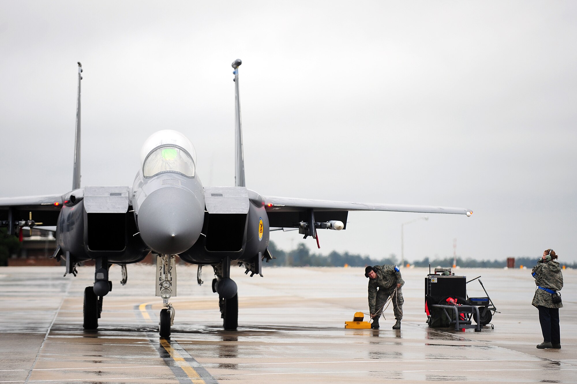 U.S. Air Force Airmen assigned to the 4th Aircraft Maintenance Squadron assist an F-15E Strike Eagle as it taxis at Seymour Johnson Air Force Base, N.C., Oct. 10, 2013.  During the aircraft’s 25-year lifetime, an array of avionics improvements coupled with a sturdier airframe have contributed to its longevity. (U.S. Air Force photo by Airman 1st Class Brittain Crolley)