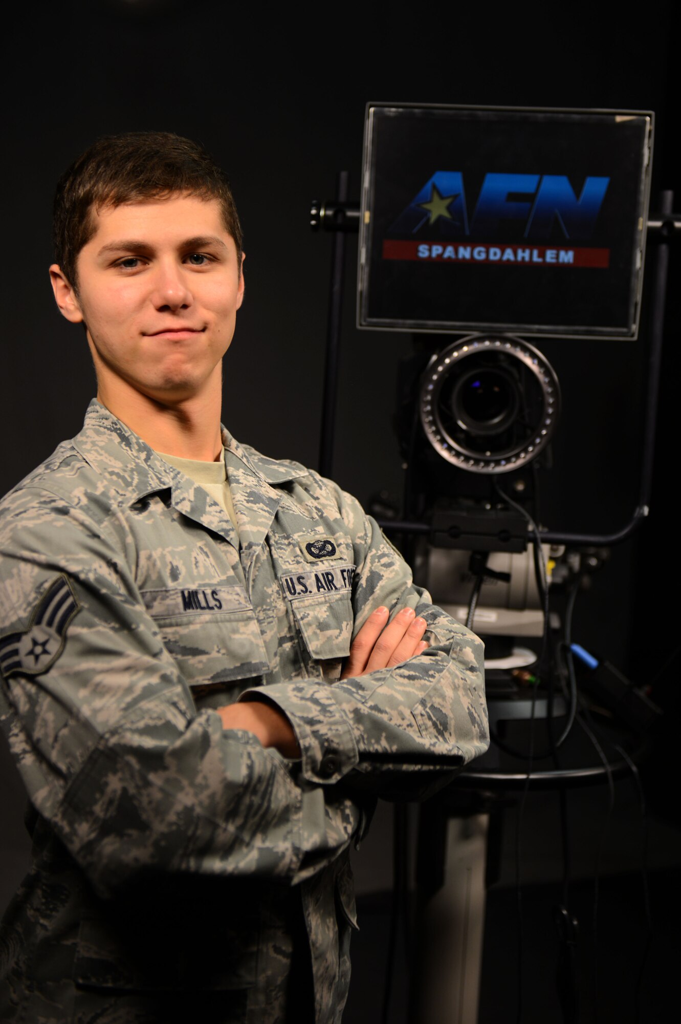 U.S. Air Force Senior Airman Evan Mills, American Forces Network Spangdahlem broadcaster, is the Super Saber Performer for the week of Oct. 17 - 23. (U.S. Air Force photo by Airman 1st Class Gustavo Castillo)