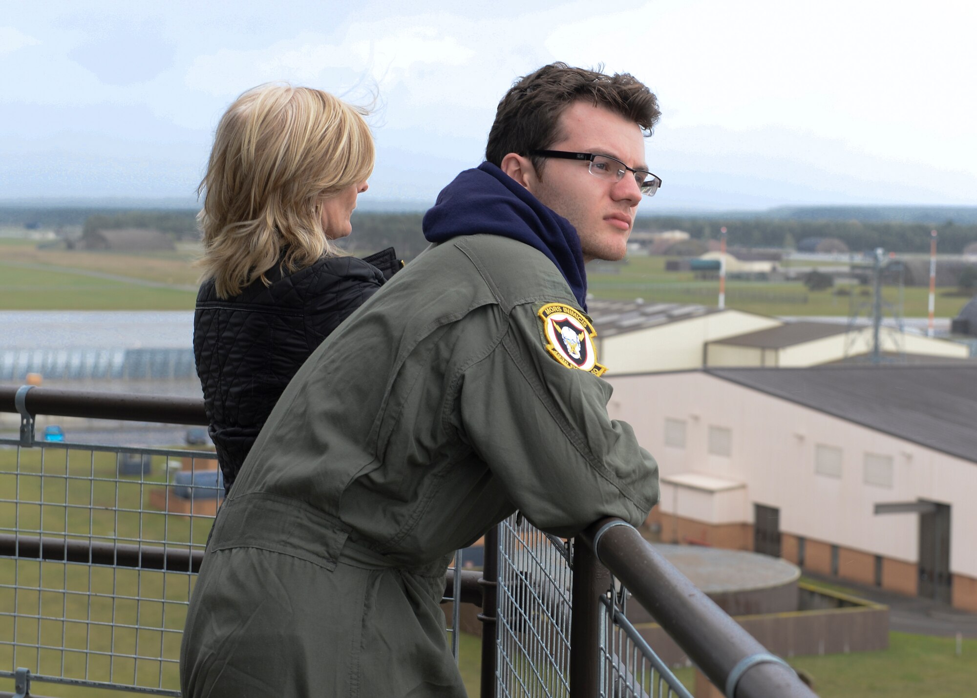Pilot for a Day participant Stephen Sutton, and his mother Jane Sutton, view the base from the air traffic control tower on Royal Air Force Lakenheath, England, Oct. 10, 2013. Pilot for a Day, started in 2012, gives local children with serious illnesses a day away from routine hospital visits to see the Air Force. (U.S. Air Force photo by Airman 1st Class Nigel Sandridge/Released)