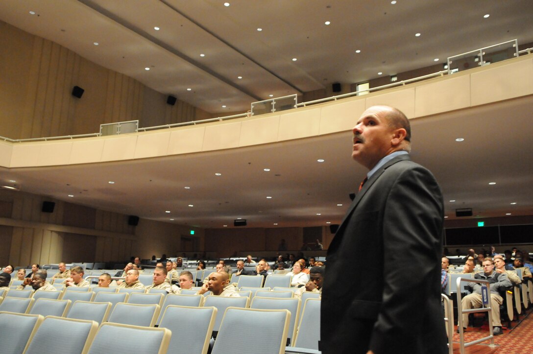 Orvel Ronk, Quantico's antiterrorism program manager, instructs Quantico employees on how to react to an active shooter situation on Oct. 10, during one of several such trainings at Little Hall. 
