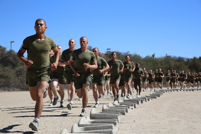 Recruits of Company C, 1st Recruit Training Battalion, perform four half-mile sprints with a cool down between each to slow their heart rates during a physical training session aboard the depot, Sept. 30. After the sprints, the recruits then moved on to the next exercises consisting of push-ups, crunches and jumping jacks. 