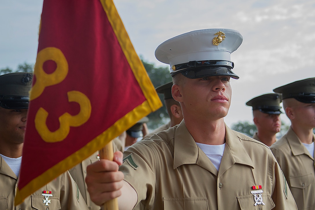 Pfc. Clark Linden, honor graduate for platoon 2083, stands at parade rest before graduation aboard Parris Island, S.C., Oct. 18, 2013. Linden, native of Clarksville, Tenn., was recruited by Sgt. Ian Olexa, recruiter from Recruiting Substation Clarksville, Recruiting Station Nashville, will be able to enjoy some much deserved leave with his family as he prepares for Marine Combat Training in Camp Geiger, N.C. (U.S. Marine Corps photo by Lance Cpl. John-Paul Imbody)