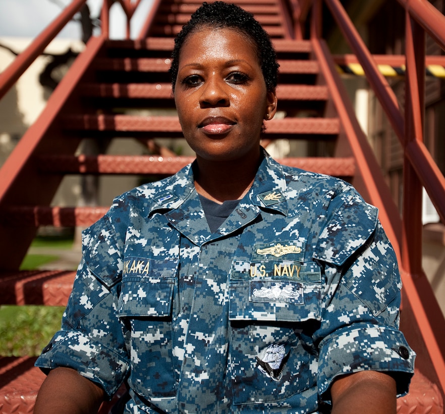 Navy Chief Warrant Officer Vanderla Akaka, the training standards officer with Afloat Training Group Middle Pacific on Naval Auxilary Landing Field Ford Island, is a two-time breast cancer survivor and a recipient of the Pink Power Mom award. The Pink Power Mom is recognized nationwide for being a mother, breast cancer survivor and a woman who helps out her community. Akaka is the first active duty service member to receive the award. (U.S. Marine Corps photo by Cpl. Sarah Dietz)