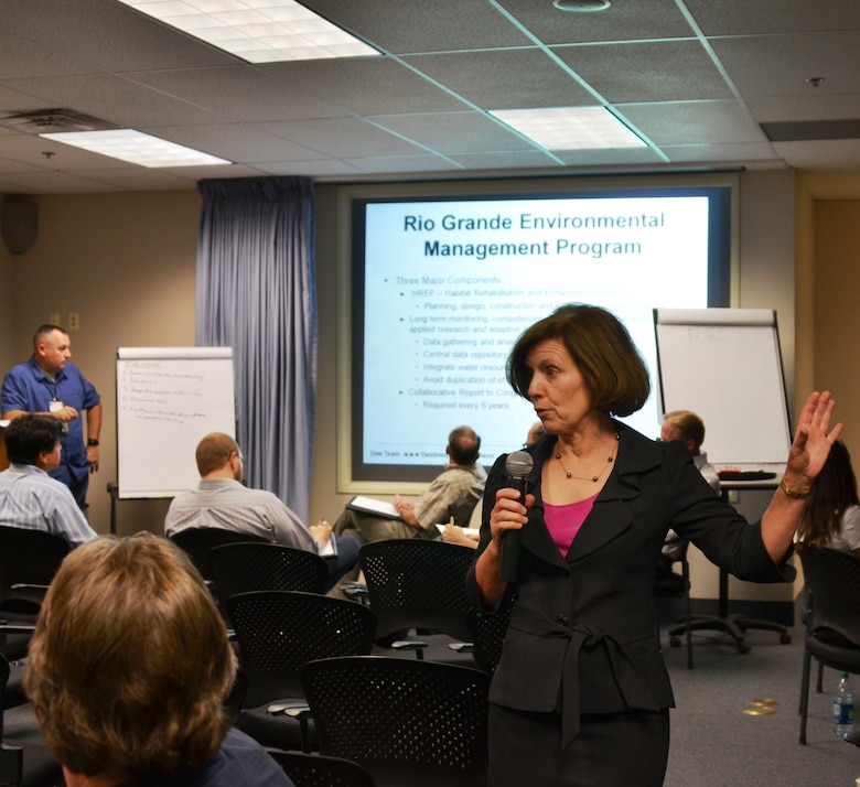 ALBUQUERQUE, N.M., -- Deb Foley, chief, civil works, Albuquerque District, discusses various projects with the meeting participants, Sept. 18, 2013.