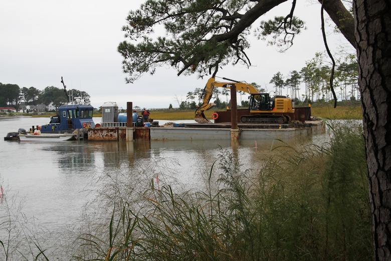Corps contractor Precon Marine Inc. of Chesapeake, Va., places fossil oyster shells around Hoffler Creek in Portsmouth, Va., to construct a .2-acre sanctuary oyster reef.  The Hoffler Creek Oyster Reef project is phase 2 of a 16-acre, six-sanctuary oyster reef initiative along the Elizabeth and Lafayette rivers. It’s part of a 10-year, $70 million, 411-acre comprehensive environmental mitigation plan accompanying the Corps’ Craney Island Eastward Expansion Project.